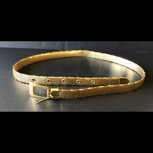 Retro gold-tone skinny belt.